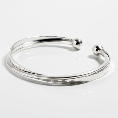 Solid Cross Torque Bangle