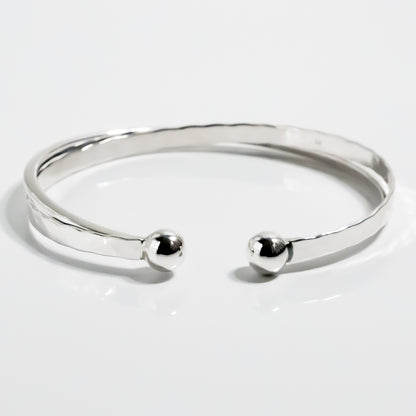 Solid Cross Torque Bangle